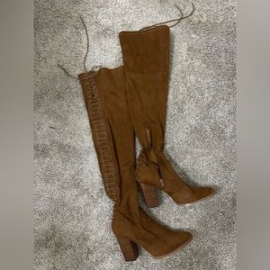 Over the knee lace up boots